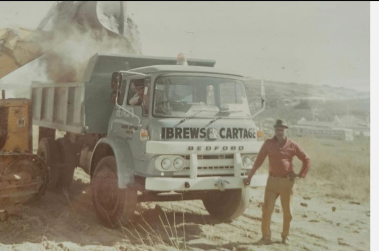 An early Ibrews Cartage Bedford truck at work